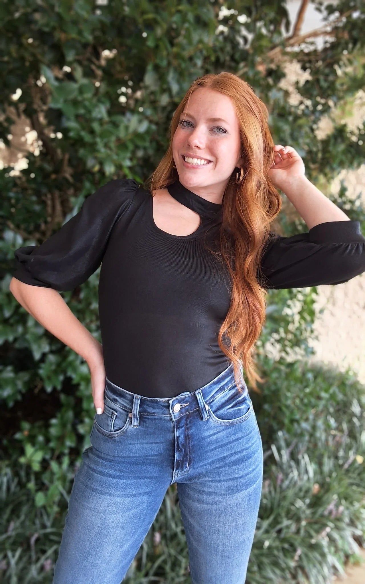 Vemoya Chic Black Cutout Bodysuit with Puff Sleeve